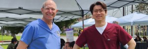 Doctors Carl Werts and Paul Yang at a Huntington Park health fair, 2023